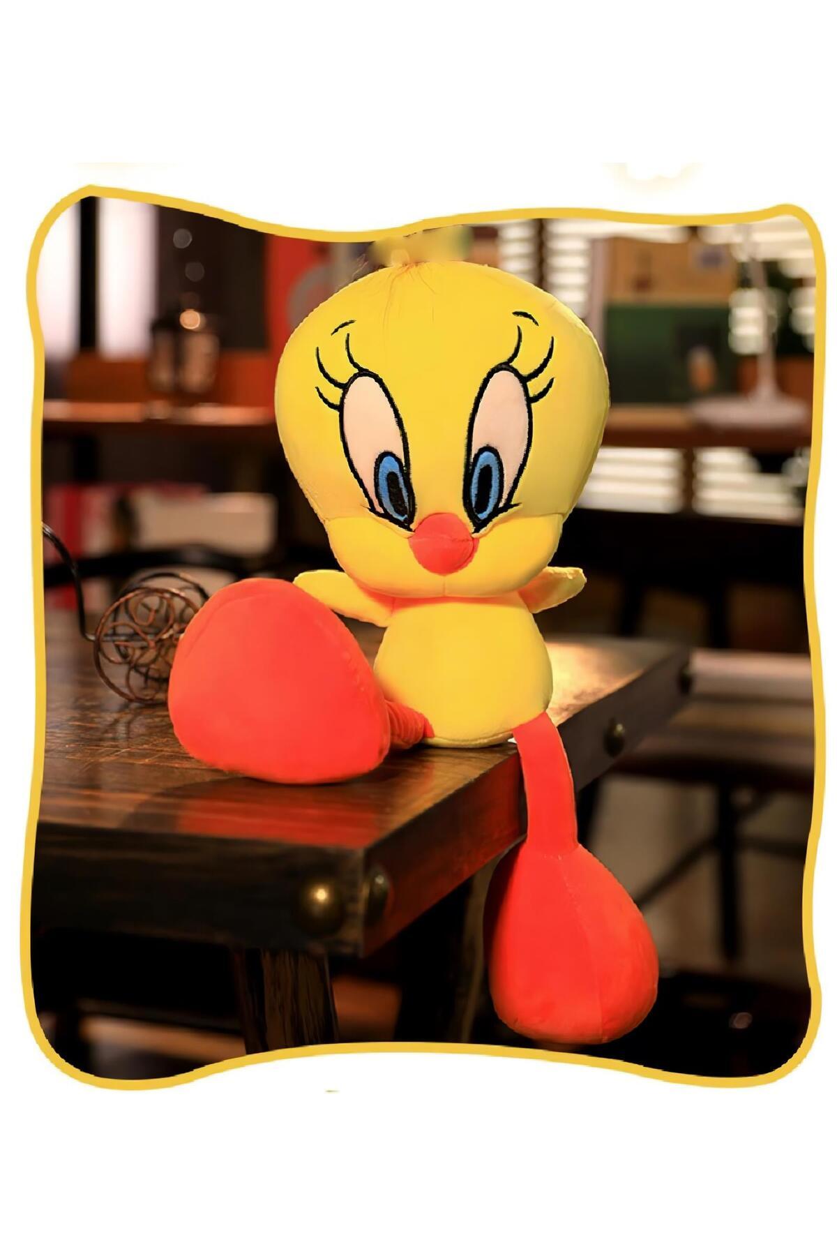 اسباب بازی های پشمی پارچه وارداتی LOONEY TUNES YELLOW CHICK TWEETY FIGURE PLUSH TOY SLEEP & PLAYMATE 25 سانتی متر. Ailenizin Oyuncakçısı