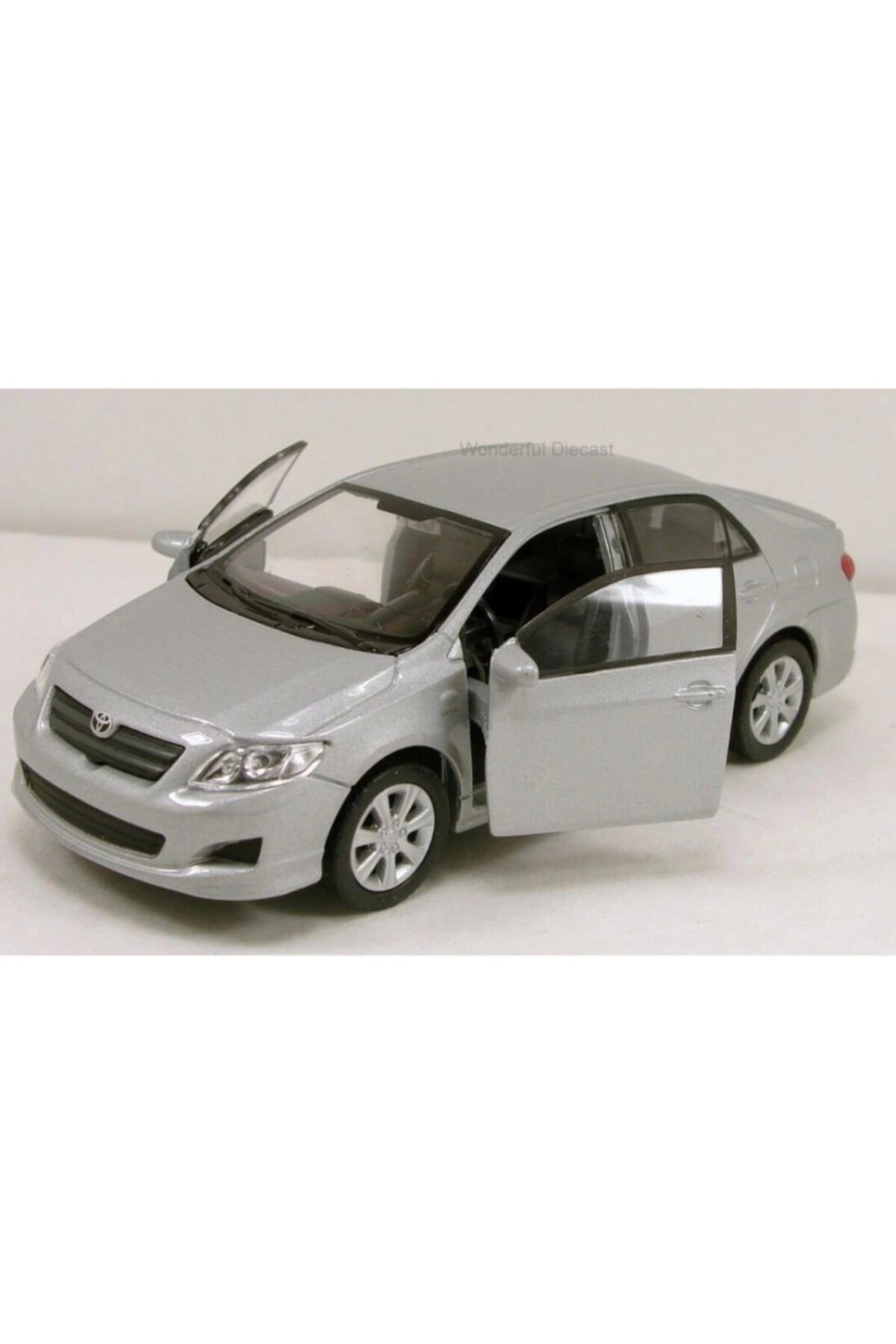 ماشین اسباب بازی TOYOTA COROLLA 1 36 SCALE PULL & DROP مدل فلزی TOY CAR GREY 2009 Welly Metal