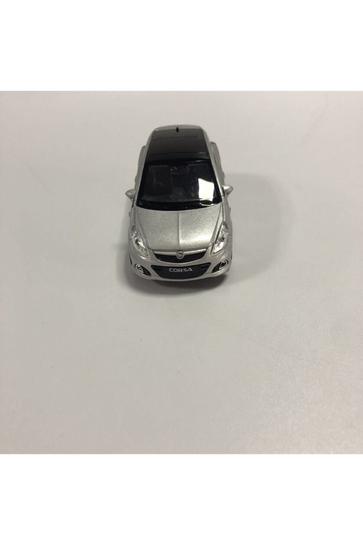 مدل خودرو دای کاست OPEL CORSA METAL PULL DROP CAR خاکستری اورجینال WELLY