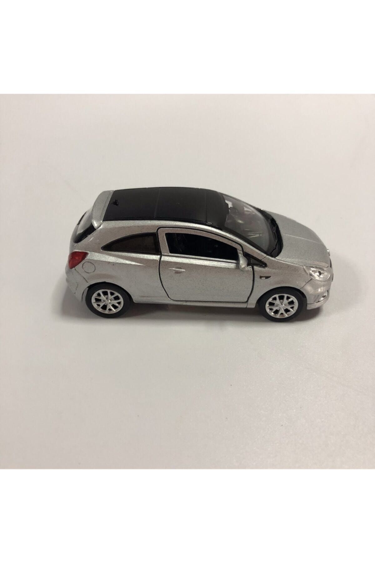 مدل خودرو دای کاست OPEL CORSA METAL PULL DROP CAR خاکستری اورجینال WELLY