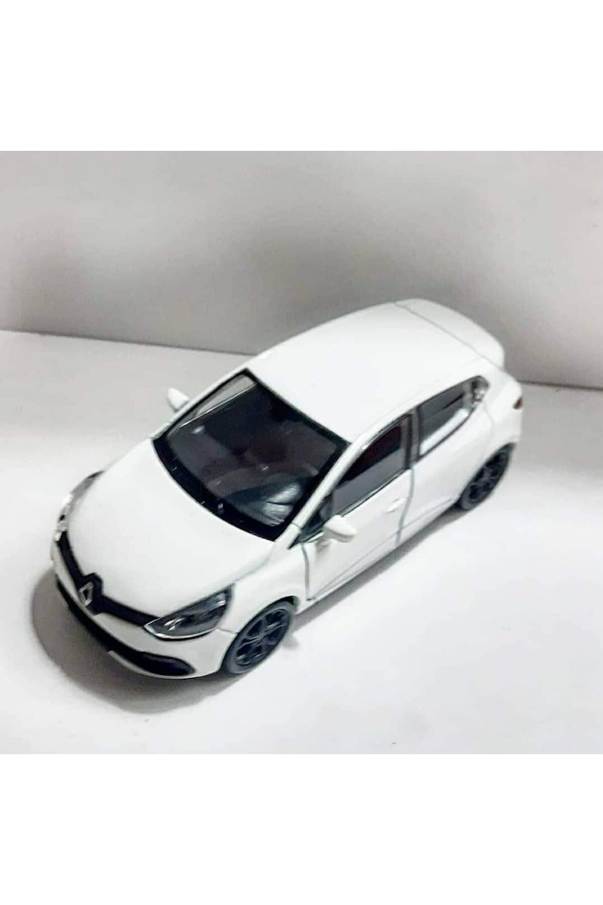 مدل خودرو 1.36 RENAULT CLIO MODEL METAL CAR سفید اورجینال WELLY