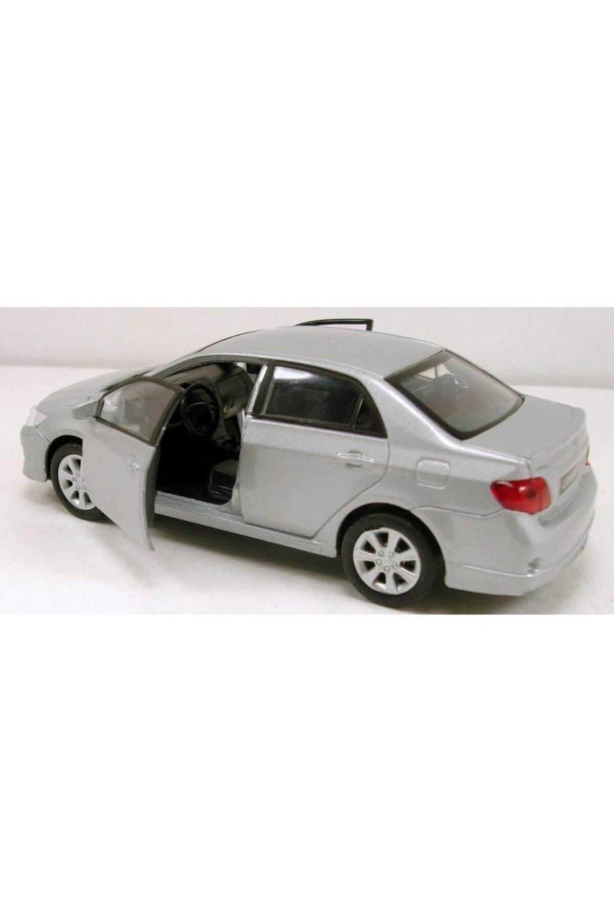 ماشین اسباب بازی TOYOTA COROLLA 1 36 SCALE PULL & DROP مدل فلزی TOY CAR GREY 2009 Welly Metal
