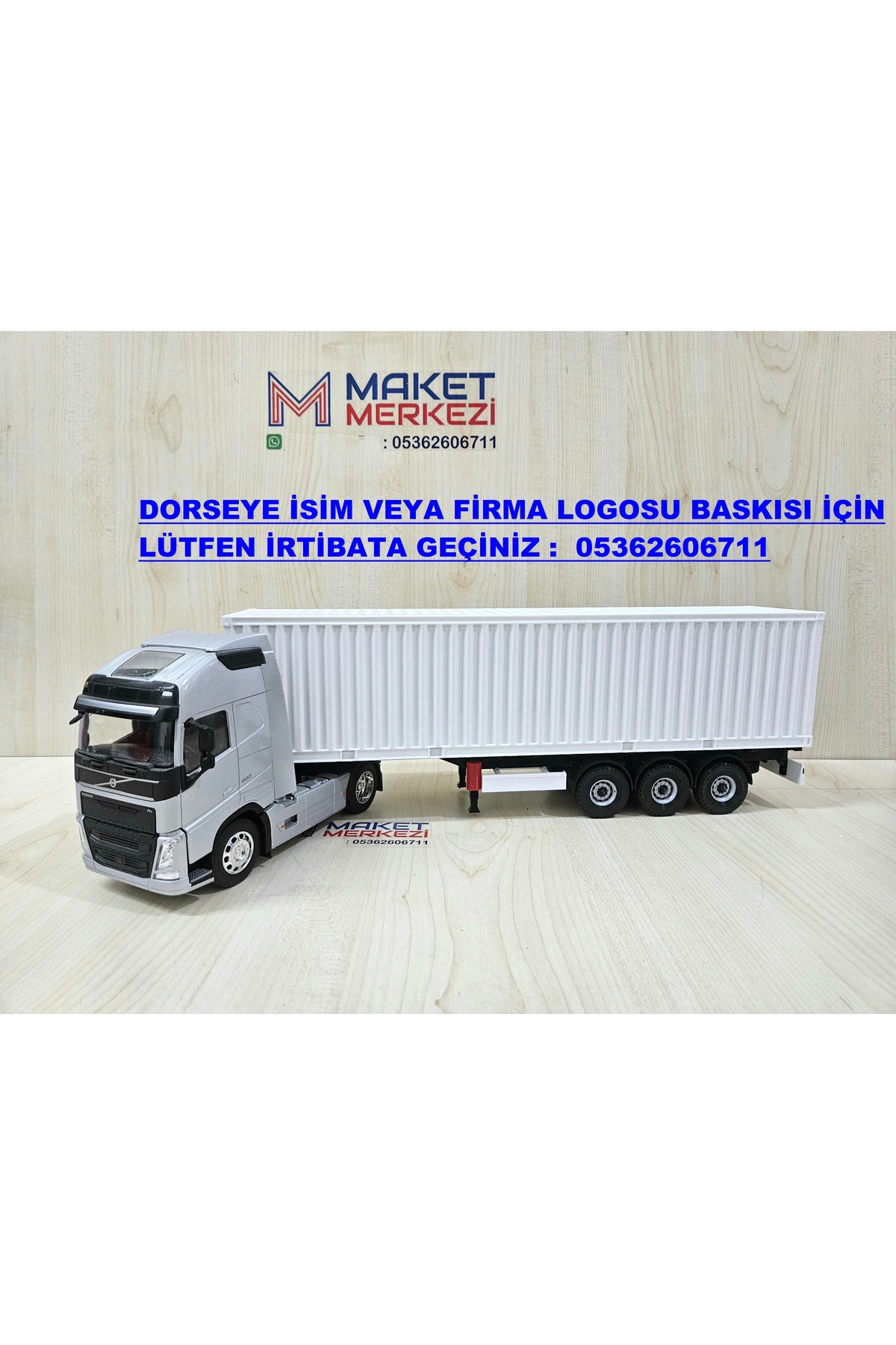 مدل خودرو کامیون کانتینری VOLVO FH4 1 32 طول نیم متر نام نوشته شده خاکستری اورجینال WELLY