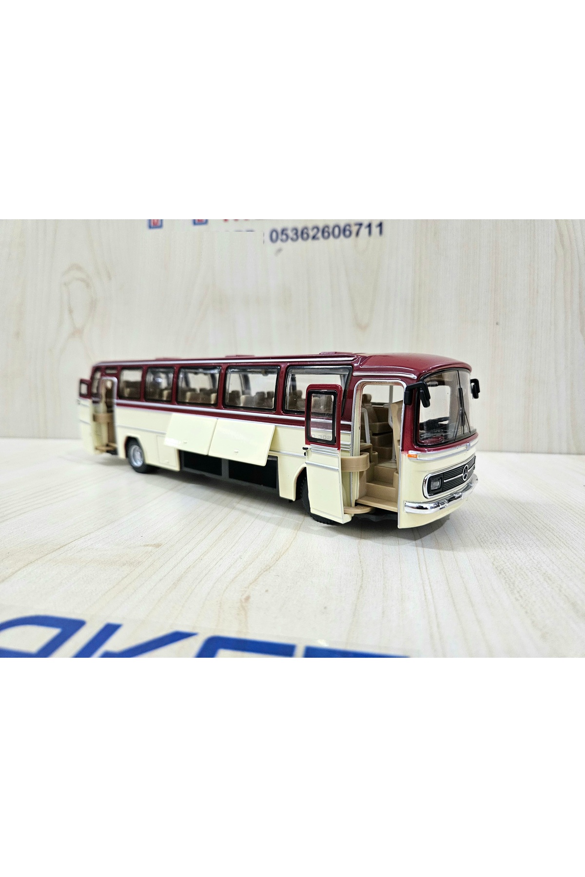مدل خودرو اتوبوس MERCEDES BENZ O302 فلز شرابی با مقیاس 1 43 25 سانتی متر اورجینال Maket