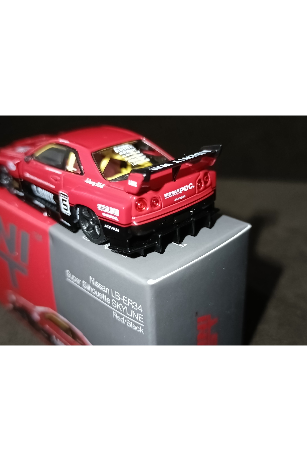 مدل خودرو نیسان LB ER34 SUPER SILHOUETTE SKYLINE قرمز مشکی اورجینال mini gt