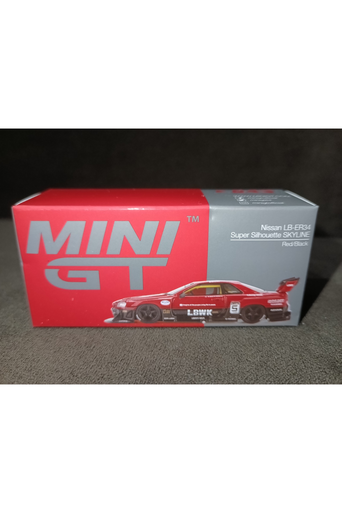 مدل خودرو نیسان LB ER34 SUPER SILHOUETTE SKYLINE قرمز مشکی اورجینال mini gt