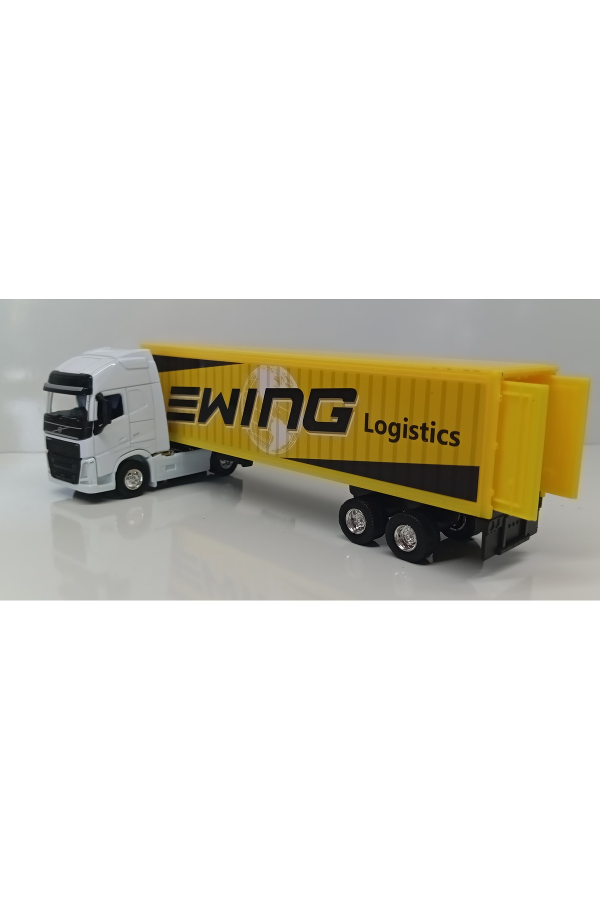 مدل خودرو DIANOMI WELLY 1:64 VOLVO FH TRAILER سایز کوچک اورجینال WELLY