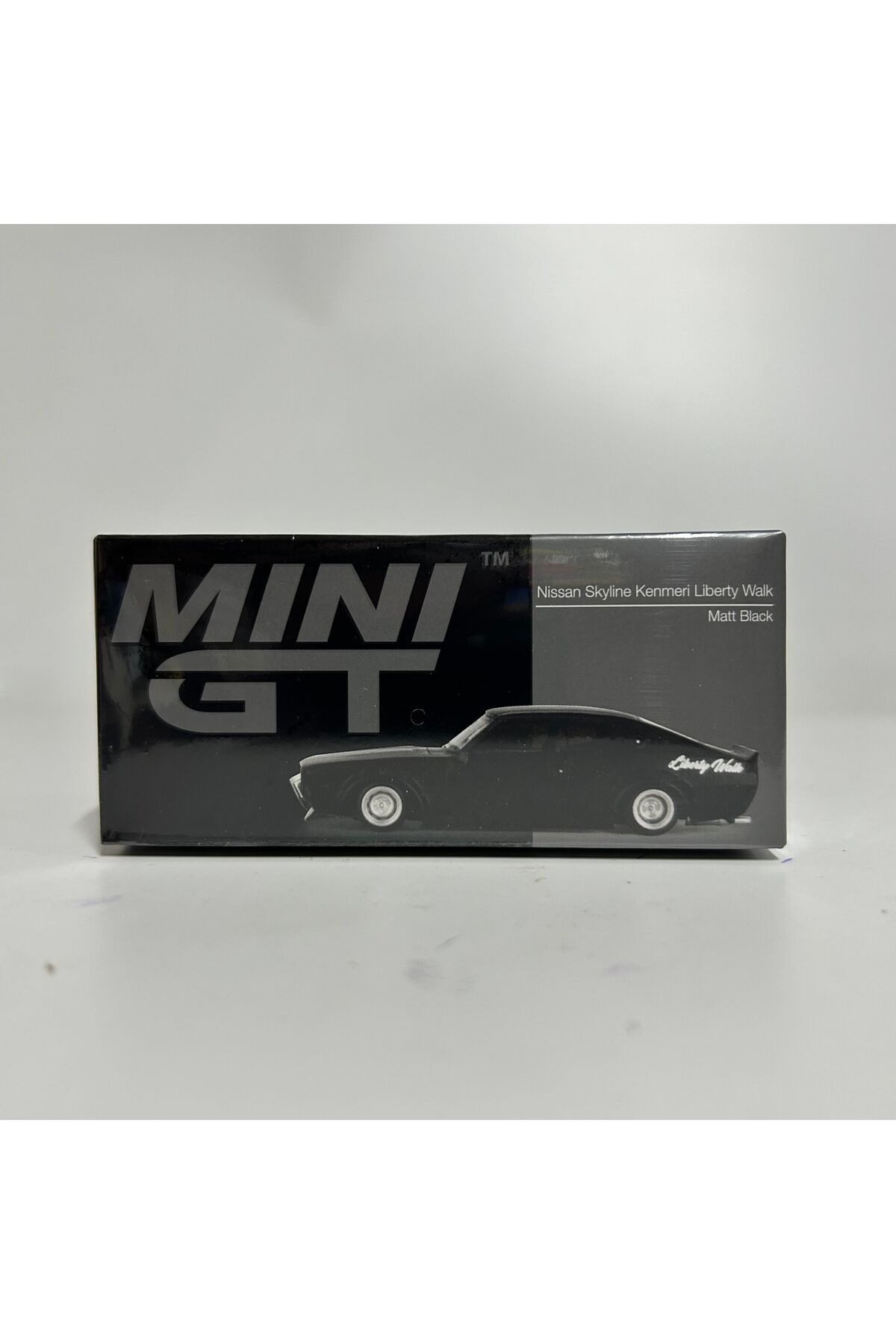 مدل خودرو 655 NISSAN SKYLINE KENMERI LIBERTY WALK MATT مشکی اورجینال mini gt