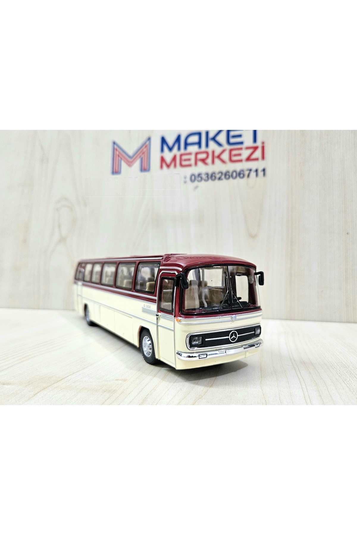 مدل خودرو اتوبوس MERCEDES BENZ O302 فلز شرابی با مقیاس 1 43 25 سانتی متر اورجینال Maket