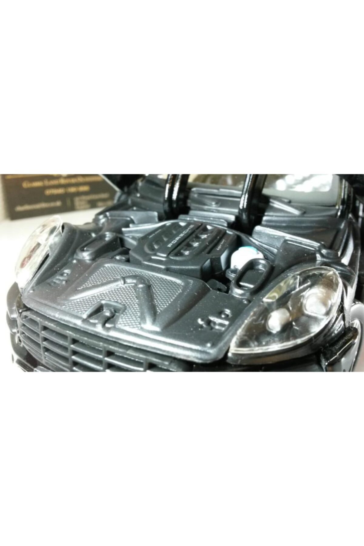 مدل خودرو پورشه ماکان 1 24 مشکی اورجینال Burago