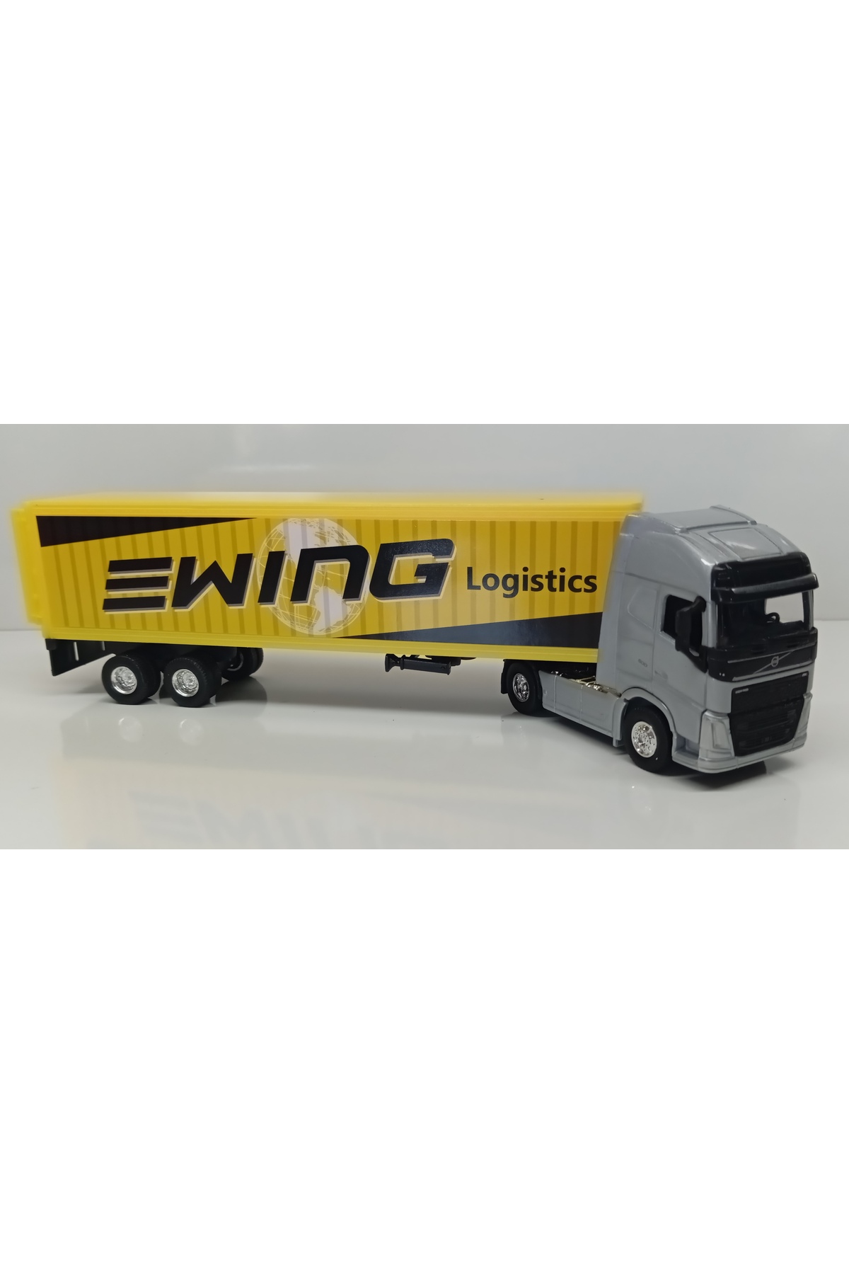 مدل خودرو DIANOMI WELLY در مقیاس 1:64 VOLVO FH TRAILER سایز کوچک اورجینال WELLY