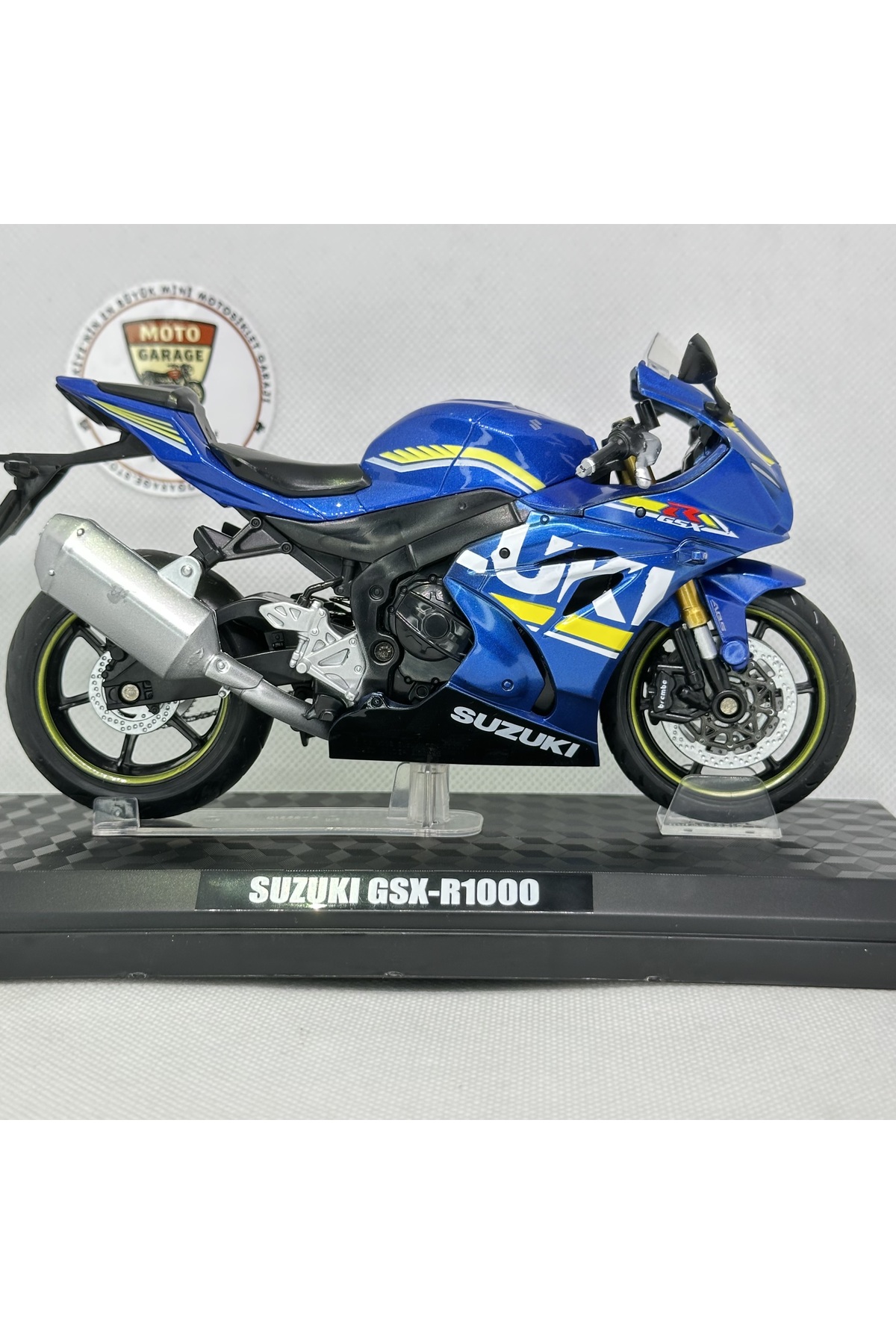 مدل خودرو سوزوکی GSX R1000 آبی تیره 1:12 17 موتورسیکلت پایه فلزی دیکست – دارای مجوز اورجینال MotoGarage