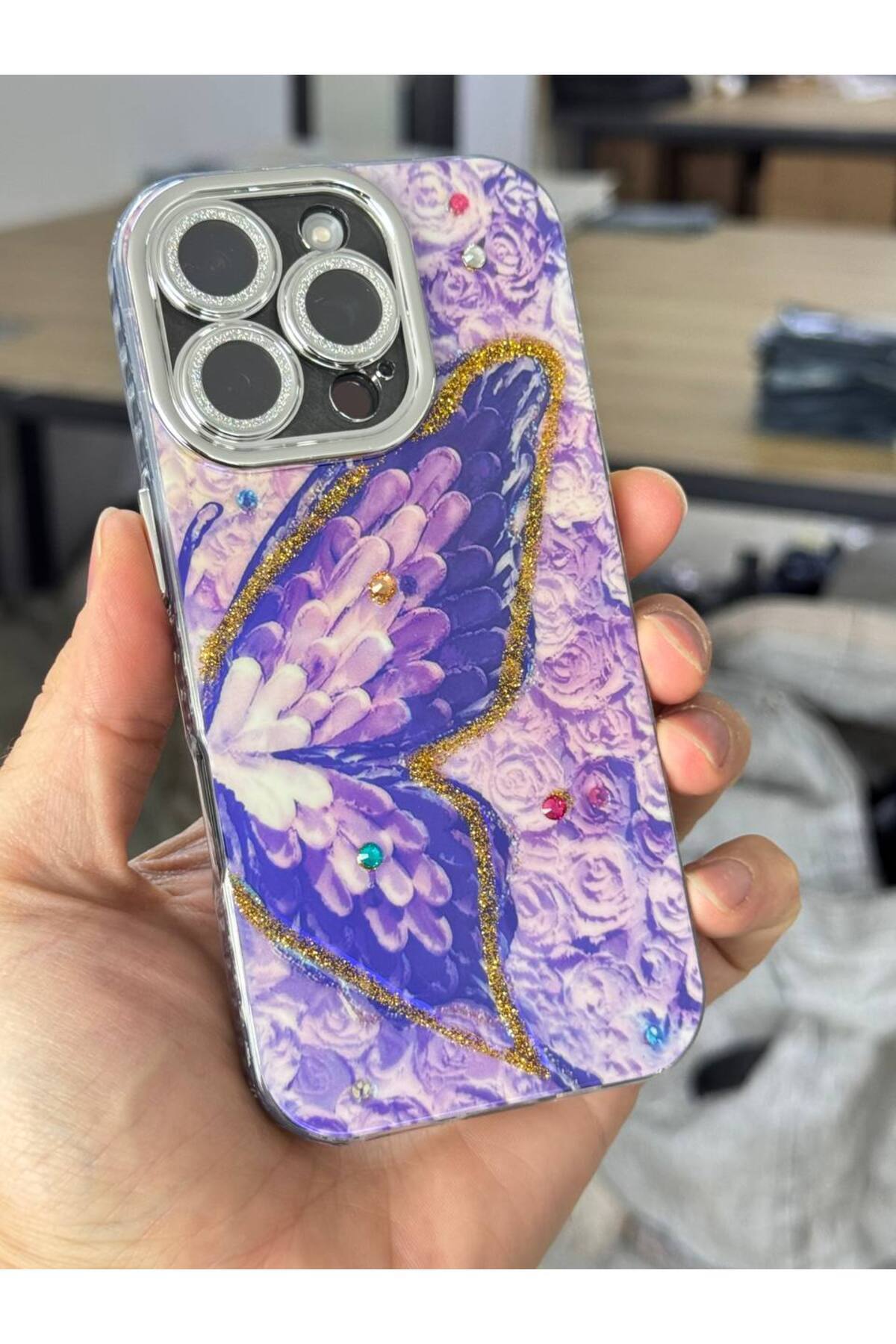 کاور و قاب محافظ لنز دوربین سنگی TRANSITION COLOR CASE IPHONE 16 PRO MAX ضربه گیر با طرح پروانه بنفش نقره ای فیبکس Fibaks