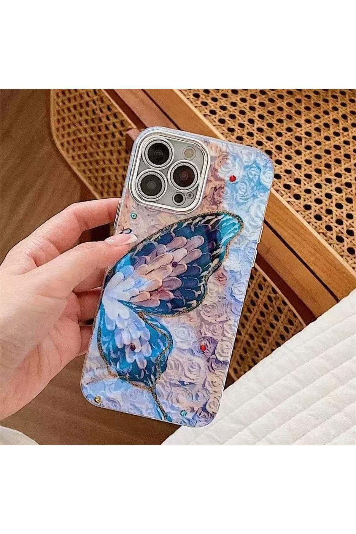 کاور و قاب محافظ لنز دوربین سنگی TRANSITION COLOR CASE IPHONE 16 PRO MAX ضربه گیر با طرح پروانه بنفش نقره ای فیبکس Fibaks
