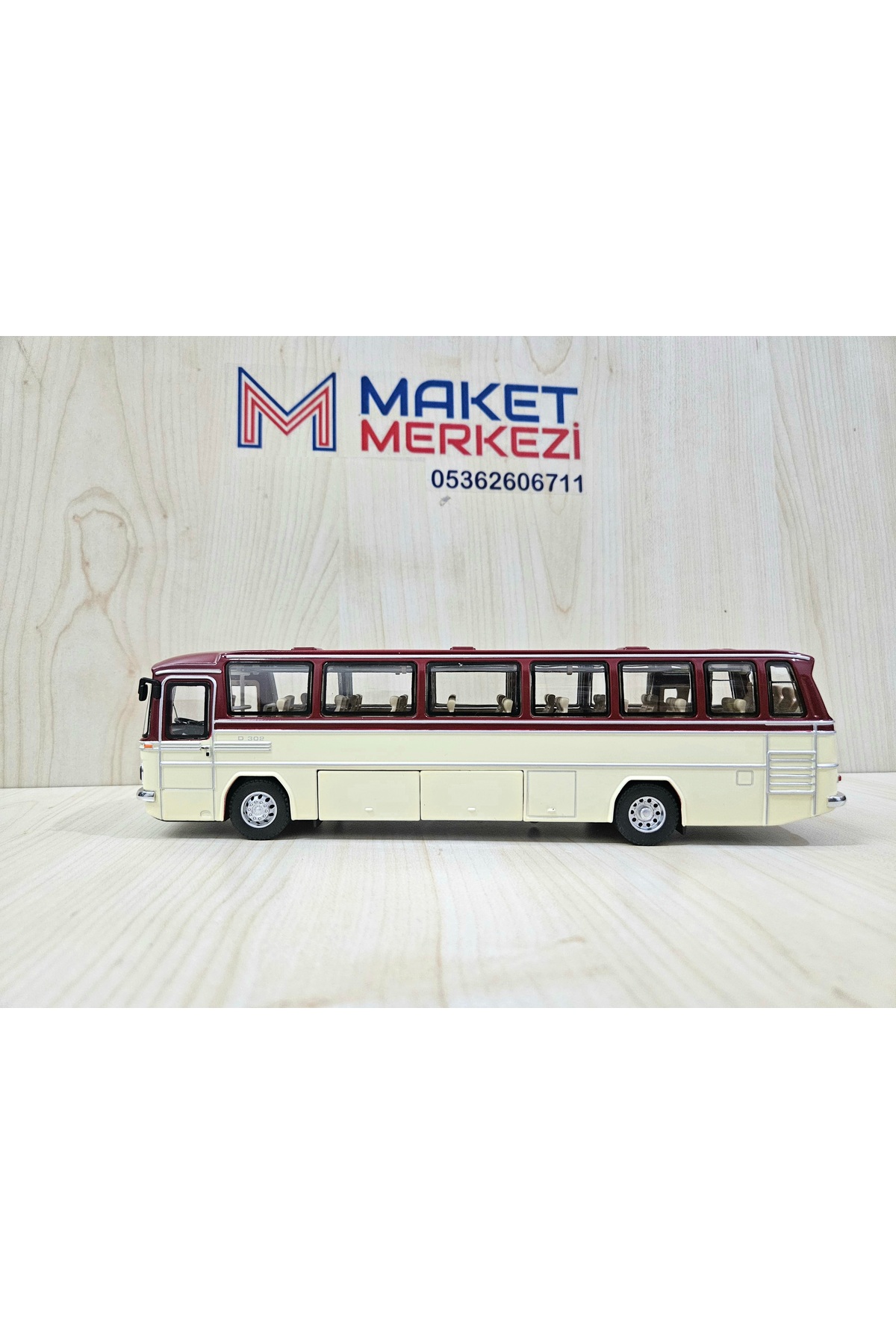 مدل خودرو اتوبوس MERCEDES BENZ O302 فلز شرابی با مقیاس 1 43 25 سانتی متر اورجینال Maket