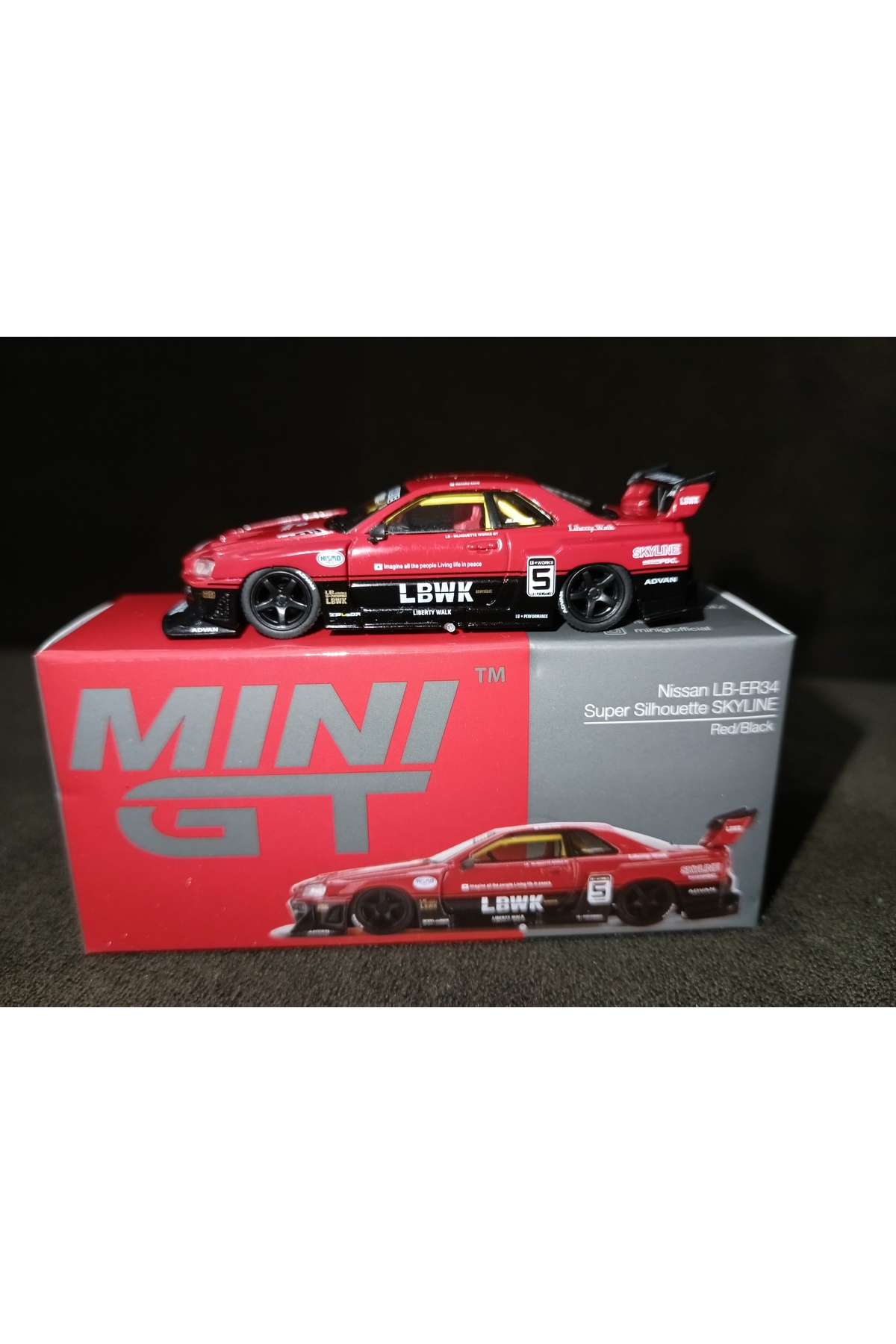 مدل خودرو نیسان LB ER34 SUPER SILHOUETTE SKYLINE قرمز مشکی اورجینال mini gt